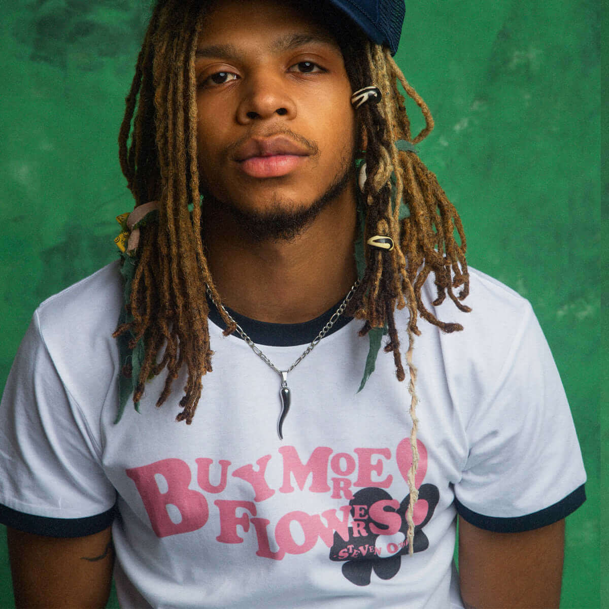 "Buy More Flowers!" Ringer T-shirt by Steven Othello