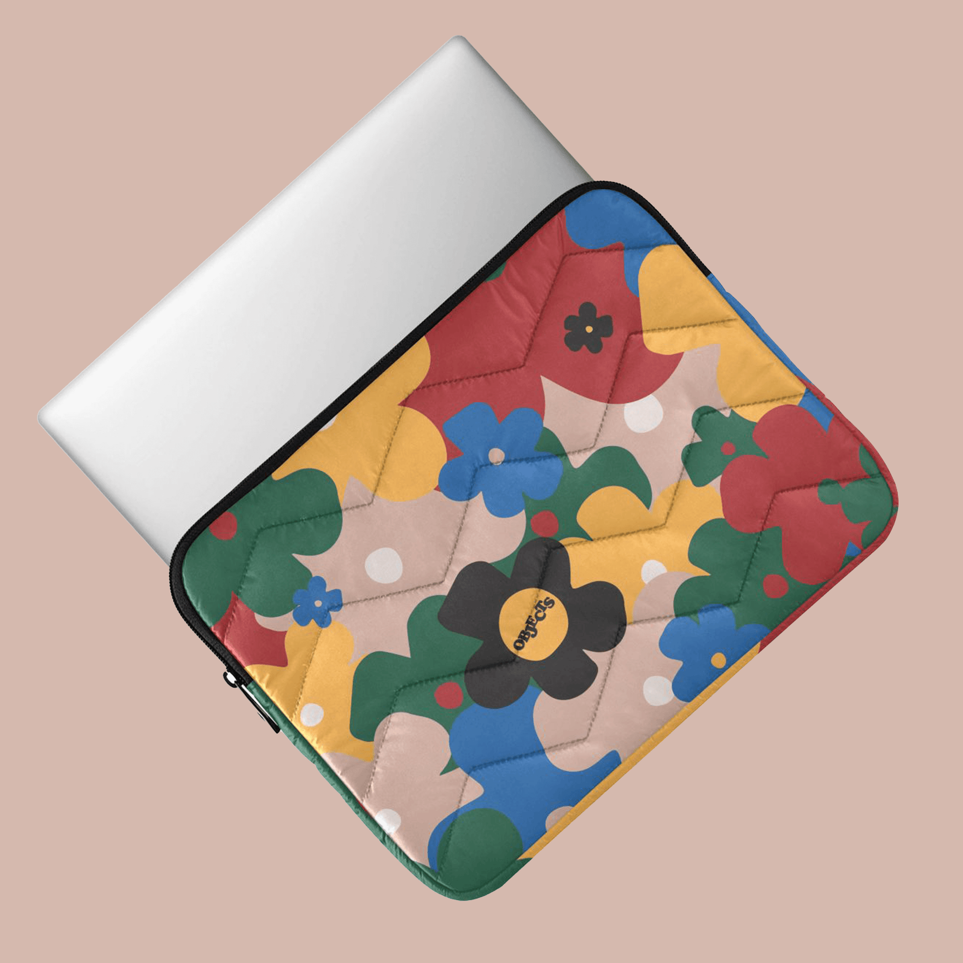 Floral laptop sleeve 13 inch featuring colorful quilted design to protect and style your 13 inch laptop.