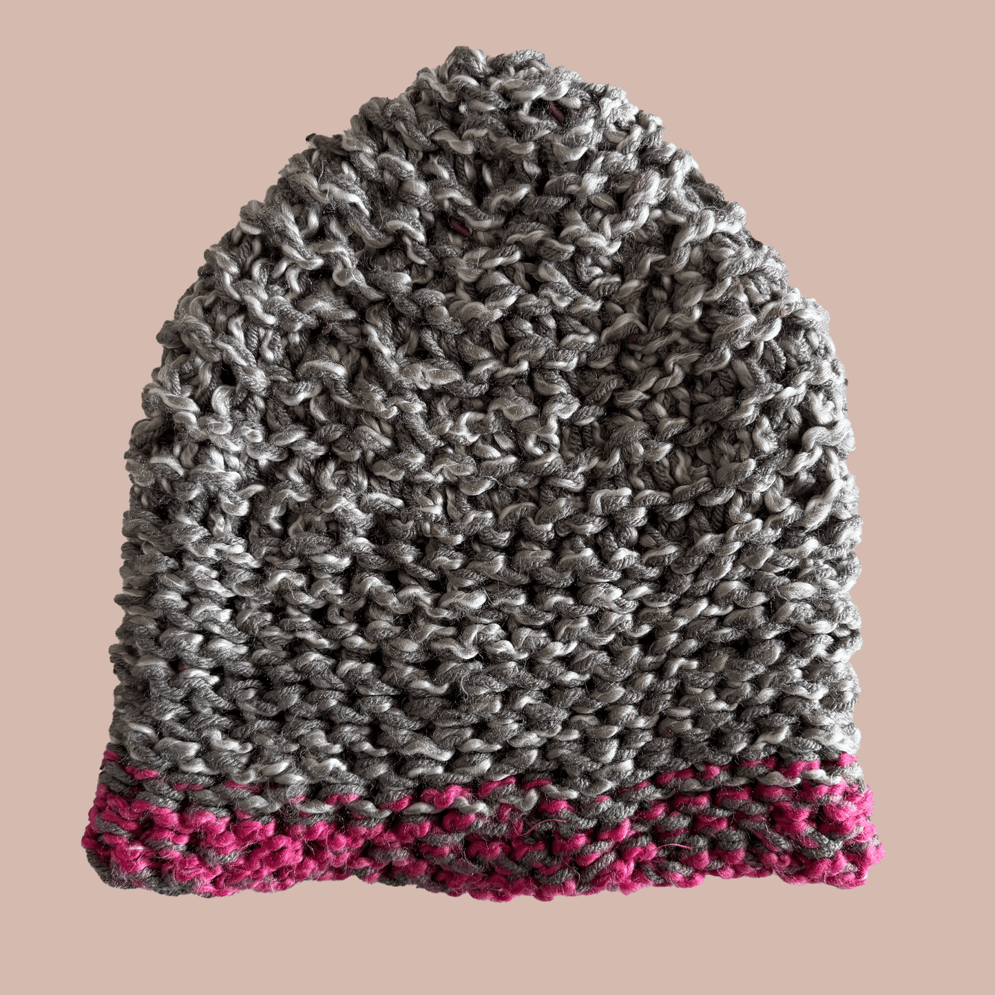 Hand knitted crochet hat in grey with pink trim, unique and completely handmade by artist Kristine Wong Chong.