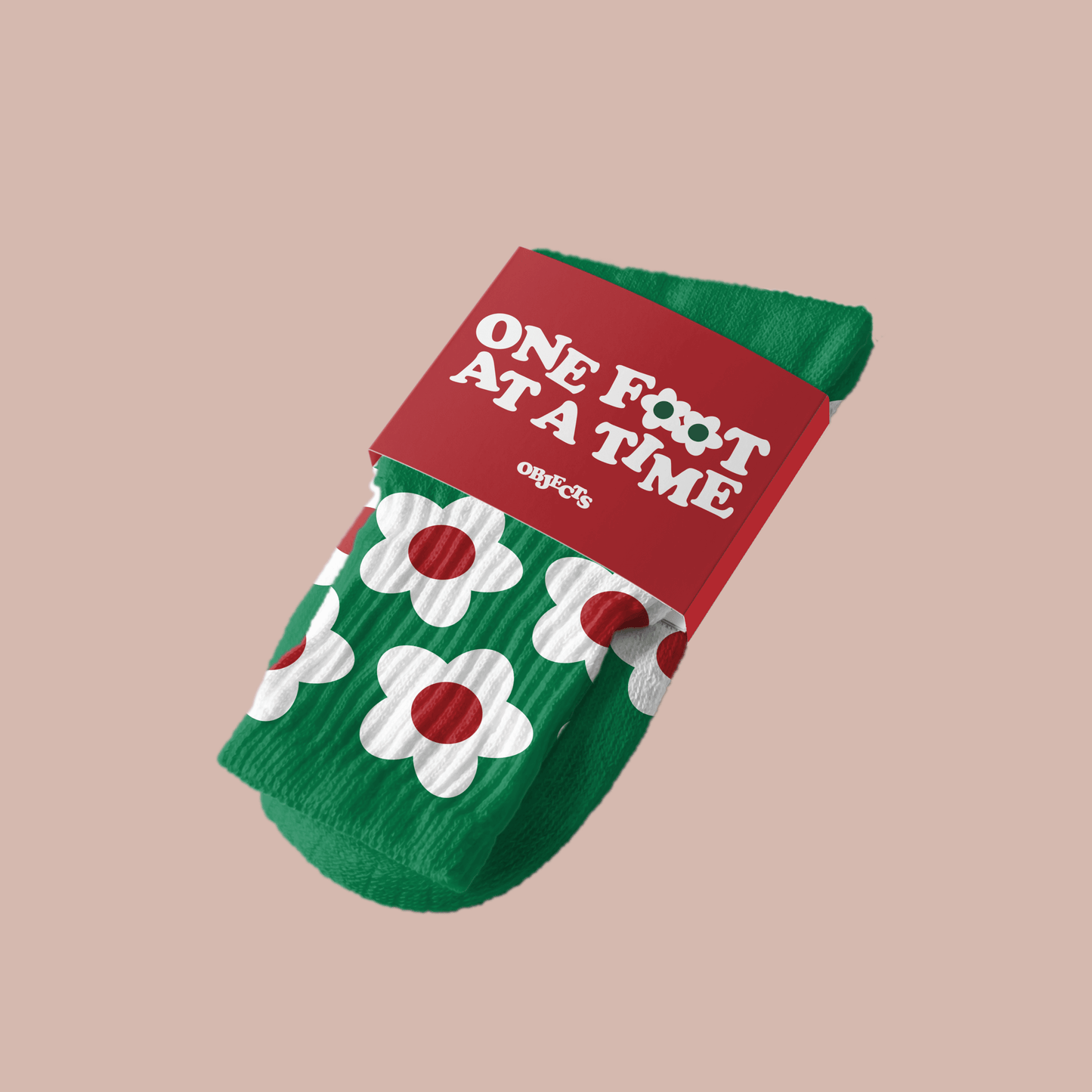 Red/Green "Bloom Socks" two pack by Steven Othello with playful floral prints on a green background.
